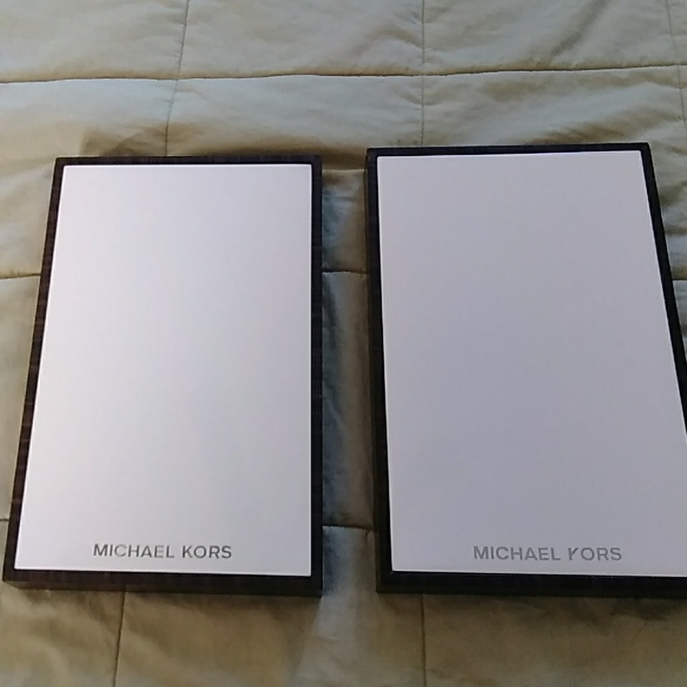 Pair of Michael Kors fixture risers